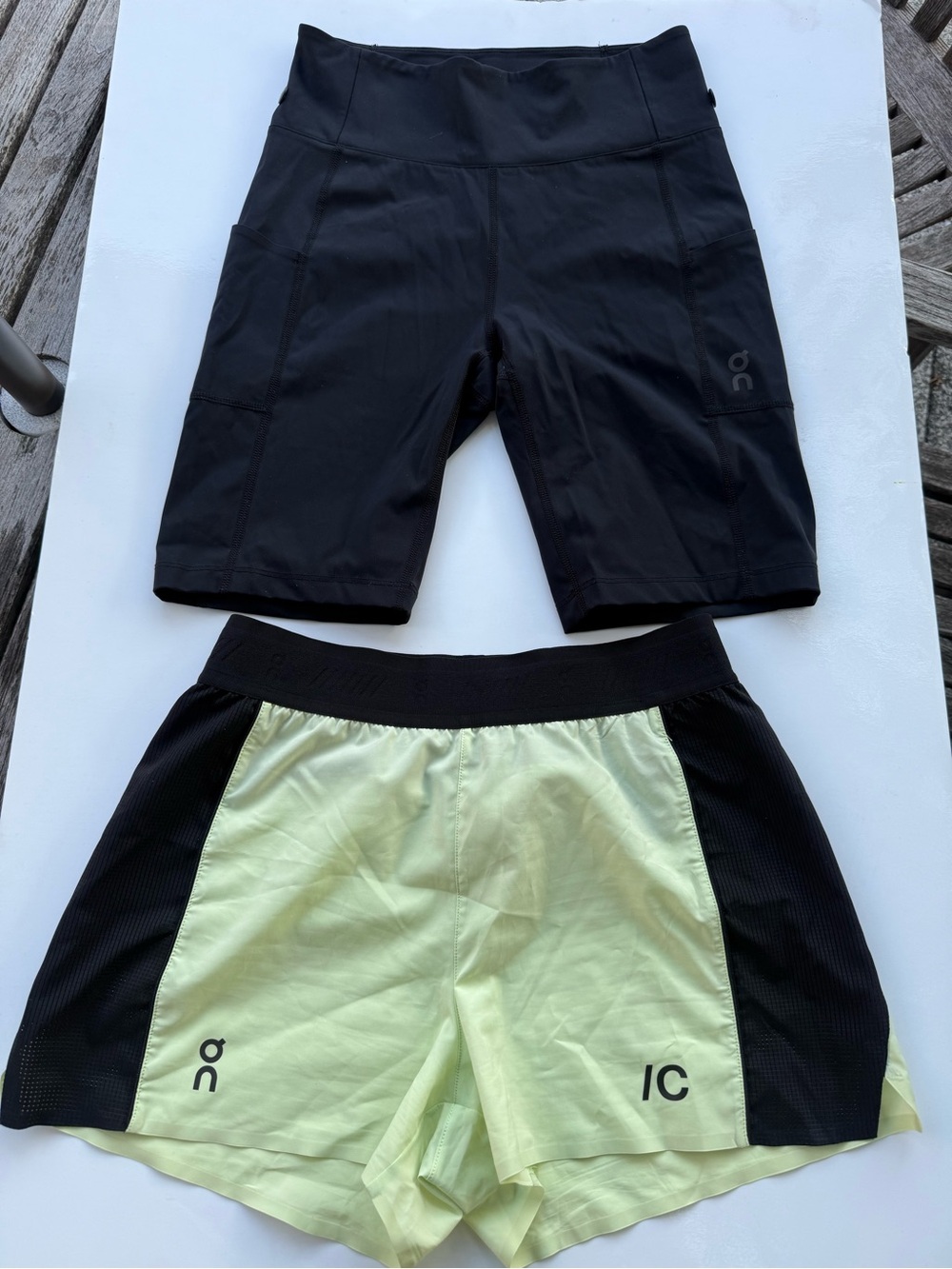 On Running Women's Black and Light Green Athletic Shorts
